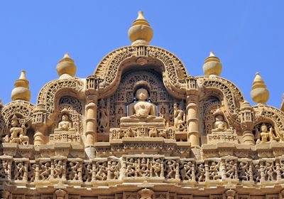 india--rajasthan--bas-relief-on-the-frontage-of-a-jain-temple-in-jaisalmer-986910156-5c4229ec46e0fb00018a6780.jpg