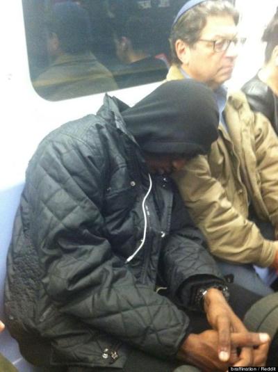 stranger-sleeps-on-subway-passenger.jpg